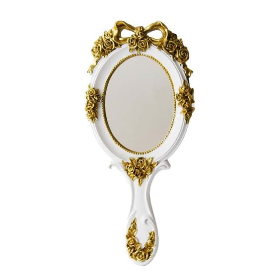 Reflecting Beauty: The Timeless Charm of the Handheld Mirror